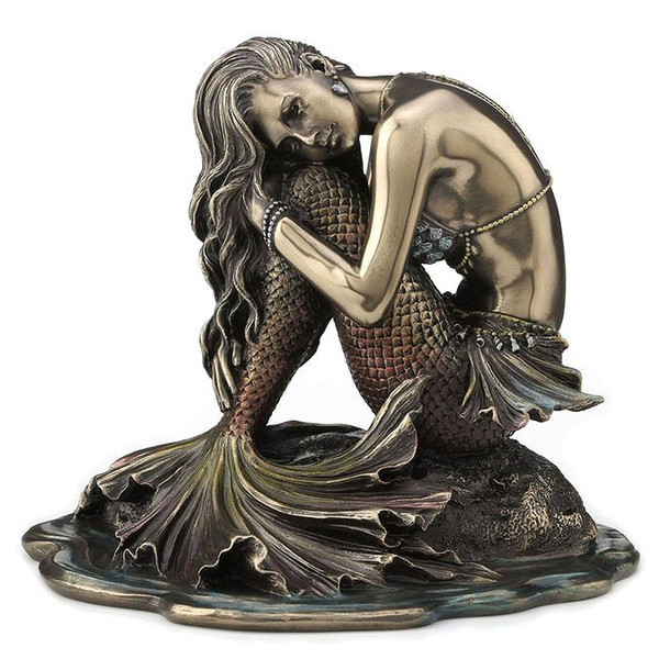 MERMAID SITTING ON ROCK