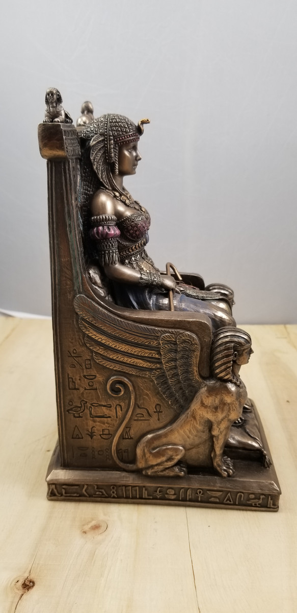 EGYPTIAN QUEEN SITTING IN THE THRONE