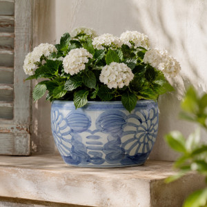 Approx. 14" Wide Blue and White Planter with Flower Motif