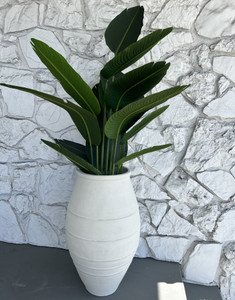 Approximately 31" high decorative planter in distressed white Approximately 31" high decorative planter in distressed white