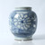 Approx. 10" Tall Blue and White Vase with Flower Motif