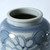 Approx. 10" Tall Blue and White Vase with Flower Motif