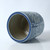 Approx. 8" Tall Blue and White Planter with Flower Motif