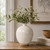 Approx. 8" High Off White Ceramic Vase with Small Opening (2" Opening)