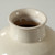 Approx. 9" Off White Glazed Ceramic Vase with Two Decorative Handles