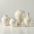 Approx. 7" High Cream Glazed Petite Ceramic Vase