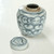 Approx.6 Inches Subtle Blue and White Round Jar with Floral Motif