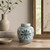 Approx.6 Inches Subtle Blue and White Round Jar with Floral Motif