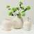 Approx. 10" H Off White Ceramic Bottle Vase with One Decorative Handle