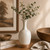 11" Off White Ceramic Bottle  with Unglazed Base