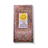 Brighten someone's day with Charley's Smiley Bar—a fun, creamy milk chocolate bar topped with colourful 100s & 1000s. Australian made and perfect for gifting.
