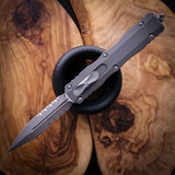 Microtech Dirac Delta DE Natural Clear Apocalyptic Partial Serrated 227-11APNC