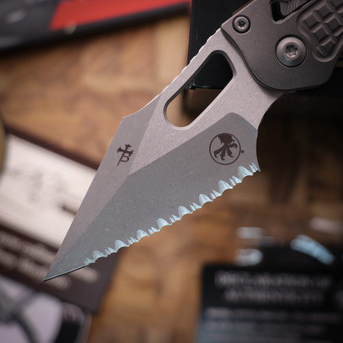 Microtech Stitch Ram-Lok Full Serrated Marfione Select Apocalyptic Frag Titanuim Microtech Stitch Ram-Lok Full Serrated Marfione Select Apocalyptic Frag Titanuim
