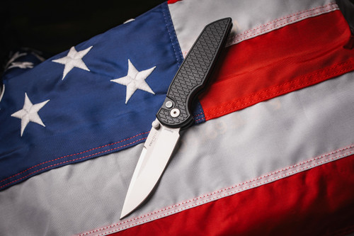 ProTech TR-3 INTEGRITY Thumbstud Manual - Relic textured black handle, machine satin MAGNACUT blade with double thumbstuds, black lip pearl button, satin hardware, wide deep carry pocket clip.