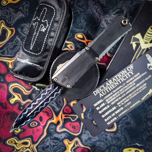 Microtech Combat Troodon LT – DE Blued Bertie Rietveld Dragonskin, Ball Bearing San Mai Damascus, Hefted Black Anodized Alloy, Bronzed Hard Cut Stainless w/ Flamed Titanium Accent 1142-16BRDBLKBZFL MCK