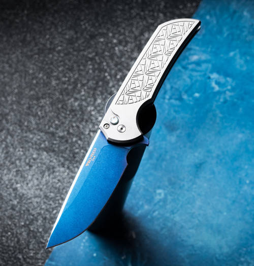 PROTECH KNIVES MORDAX - HARDENED 17-4 STAINLESS STEEL NEXUS TEXTURED HANDLES, SAPPHIRE BLUE MAGNACUT BLADE, SATIN HARDWARE, ABALONE BUTTON, POLISHED CLIP.