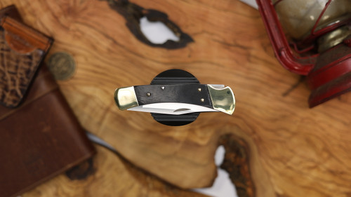 BUCK 110 SLIM ELITE MAGNACUT EBONY-BRASS HANDLE CLIP POINT BLADE 14259