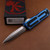 Microtech Scarab II Gen III Double Edge Full Serrate Stonewash Blue Handle 1280-12BL