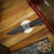 AUXILIARY MANUFACTURING POCKET BOWIE, FORDITE/BLACK G10/ COLORED LINER, VEGAS FORGE DAMASCUS CC554