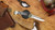BUCK 110 SLIM ELITE MAGNACUT EBONY-BRASS HANDLE CLIP POINT BLADE 14259
