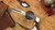 BUCK 110 SLIM ELITE MAGNACUT EBONY-BRASS HANDLE CLIP POINT BLADE 14259
