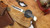 BUCK 110 SLIM ELITE MAGNACUT EBONY-BRASS HANDLE CLIP POINT BLADE 14259
