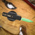 MICROTECH UTX-85 GEN IV D/E PART SERRATE JEDI MASTER W/GREEN BLADE, BRONZE HARDWARE, & BLACK CHASSIS 12324-2JM