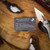 MICROTECH M-STITCH- RAM-LOK MARFIONE SELECT STONEWASH FINISH STONEWASH FINISH SLAB SIDE TITANIUM W/ BRONZE TITANIUM ACCENT DOUBLE VAPOR BLAST STAINLESS 169MRL-10MS1