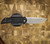 PROTECH KNIVES MORDAX, BLACK HANDLE, CASTED WHITE BRASS "USA 250TH" DESIGN, STONEWASH MAGNACUT BLADE, WHITE PEARL BUTTON, SERIALIZED OF 100