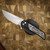 PROTECH KNIVES MORDAX, BLACK HANDLE, CASTED WHITE BRASS "USA 250TH" DESIGN, STONEWASH MAGNACUT BLADE, WHITE PEARL BUTTON, SERIALIZED OF 100
