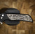 PROTECH KNIVES MORDAX, BLACK HANDLE, CASTED WHITE BRASS "USA 250TH" DESIGN, STONEWASH MAGNACUT BLADE, WHITE PEARL BUTTON, SERIALIZED OF 100 BSA26.MORDAX.2