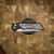 PROTECH KNIVES MORDAX, BLACK HANDLE, CASTED WHITE BRASS "USA 250TH" DESIGN, STONEWASH MAGNACUT BLADE, WHITE PEARL BUTTON, SERIALIZED OF 100 BSA26.MORDAX.2
