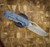 MCNEES KNIVES DIXON ROCK TEXTURE, BLUE HANDLE, STONEWASHED BLADE, STONEWASHED HARDWARE, MAGNACUT SIMS1T2522