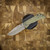 MCNEES KNIVES PM MAC 2 3" ROCK TEXTURE GREEN/ BRONZE HANDLE, STONEWASHED BLADE, STONEWASHED HARDWARE, DROP POINT, MAGNACUT SIMS1T2560