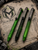 HERETIC KNIVES SCRIBE FLIPPER PEN BLACK AND GREEN FADE WITH GREEN SPLATTER MAVERICK CUSTOMS COLLAB