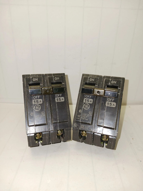 LOT OF 2) GENERAL ELECTRIC 15 AMP CIRCUIT BREAKER 120/240 VAC BOLT ON THQB215