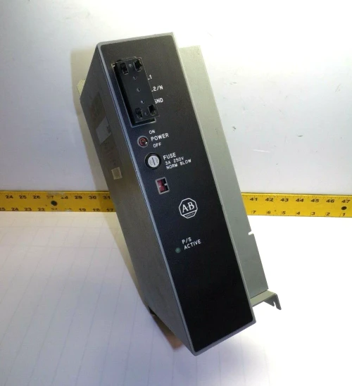 ALLEN BRADLEY POWER SUPPLY MODULE INPUT 120/220 VAC OUTPUT 5 VDC 1771-P7 SER B