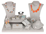 The Latest: Grey Linen Jewelry Displays