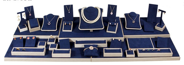 34-Piece Navy Blue Faux Suede Jewelry Display Set with Beige Trim – 40" x 16" x 7.5"H Complete Showcase Display Kit