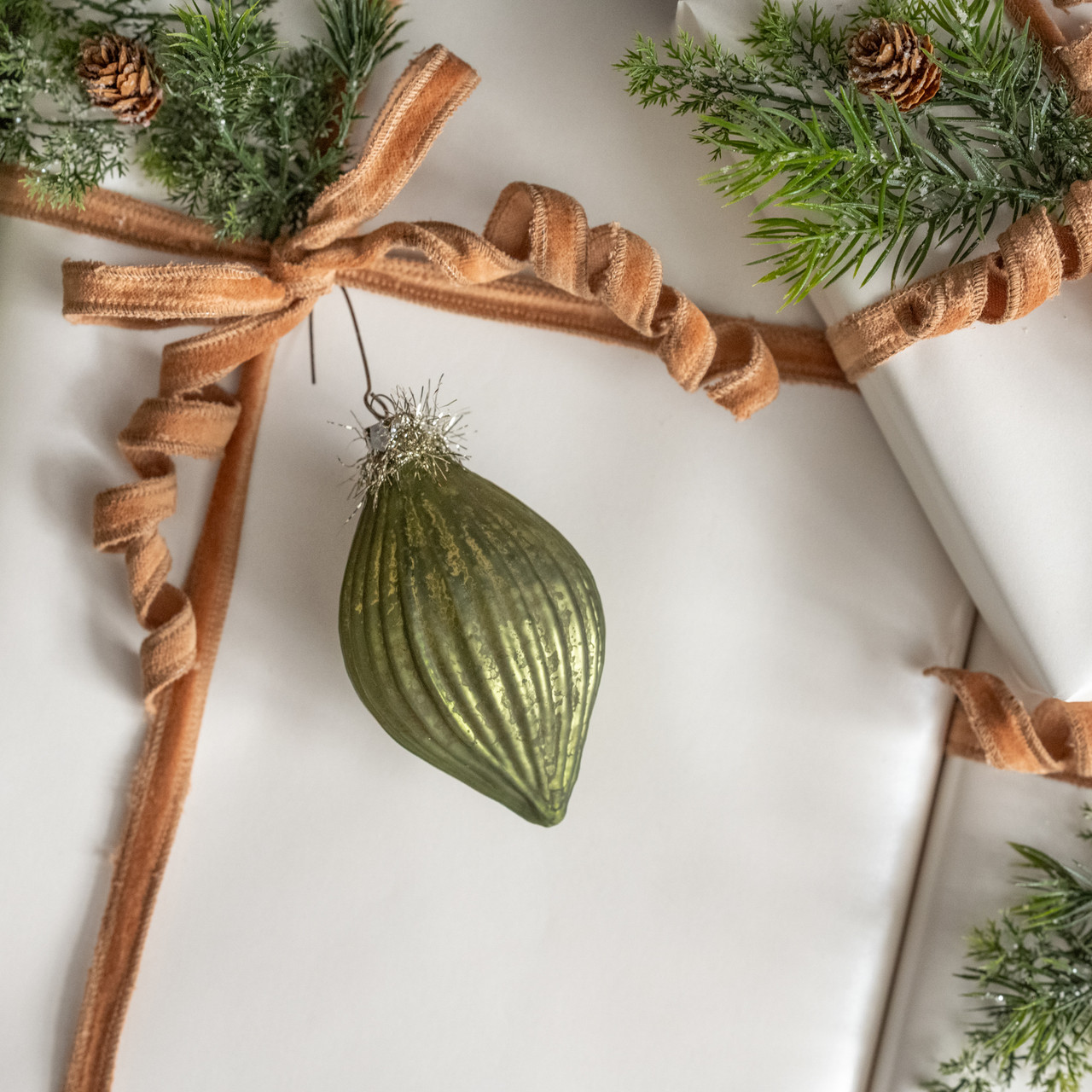 GREEN GLASS ORNAMENT W/ TINSEL TOP