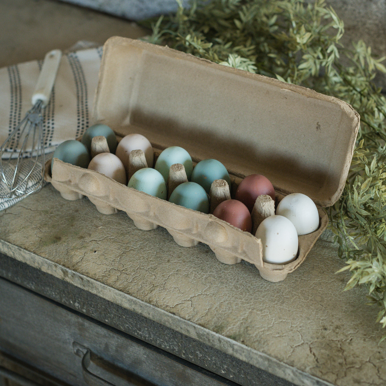 DOZEN PAINTED WOODEN EGGS