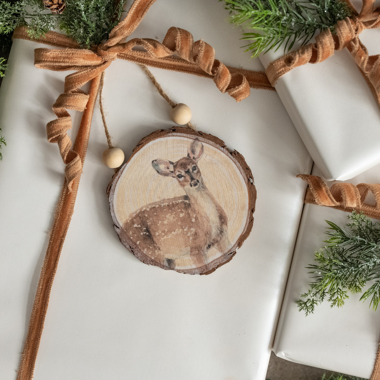 DEER ON WOOD SLICE ORNAMENT