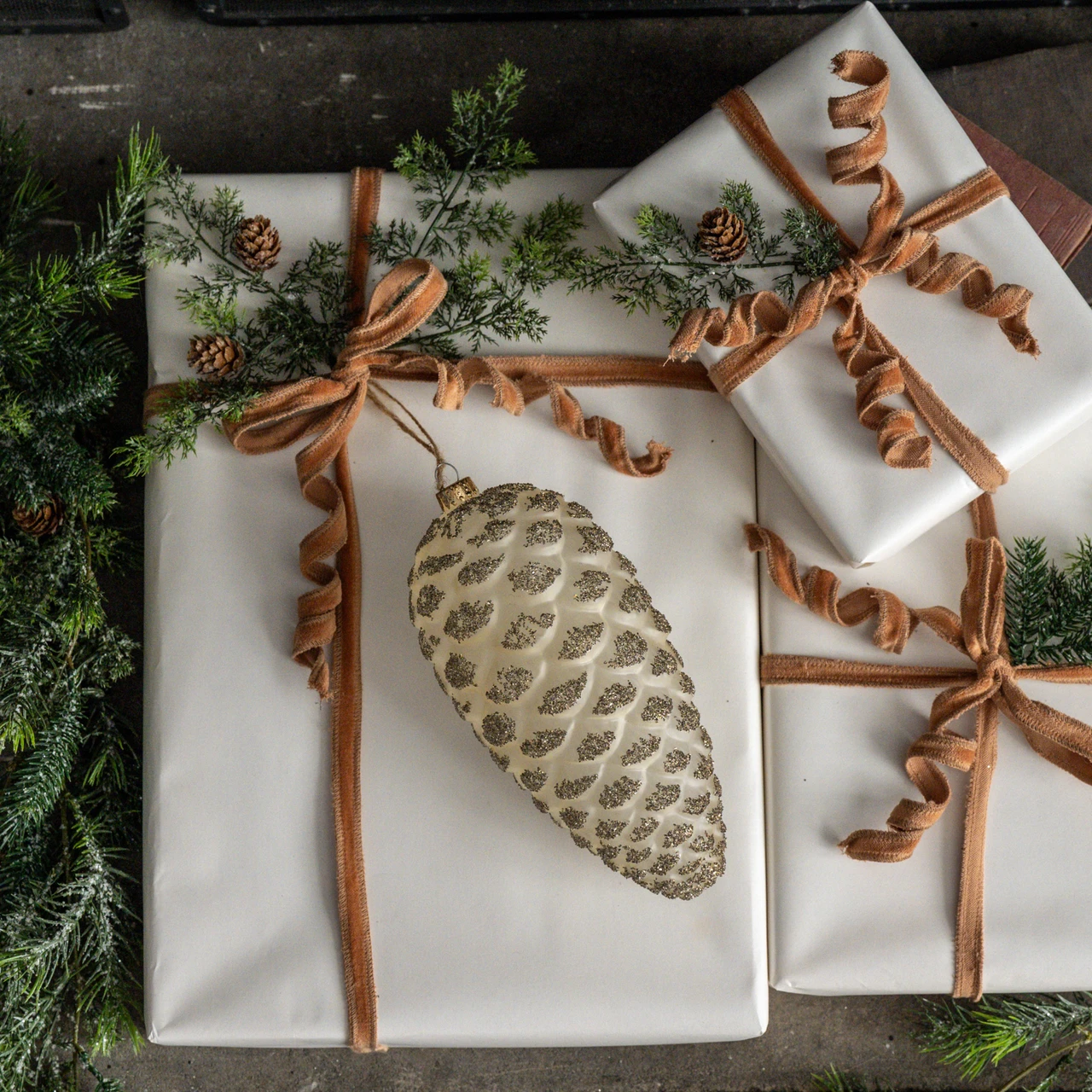 8.5" CREAM PINECONE W/ SILVER GLITTER ORNAMENT