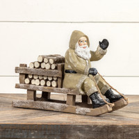 TAN SLEDDING SANTA