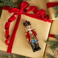 TUCKER NUTRACKER ORNAMENT