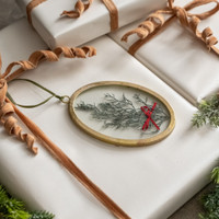 OVAL PRESSED HOLIDAY FLORAL W/ RED BOW ORNAMENT