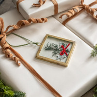 SQUARE PRESSED HOLIDAY FLORAL W/ RED BOW ORNAMENT