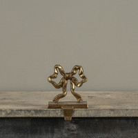 GOLD BOW STOCKING HOLDER