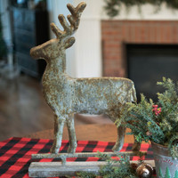 DISTRESSED METAL DEER ON FAUX WOOD BASE