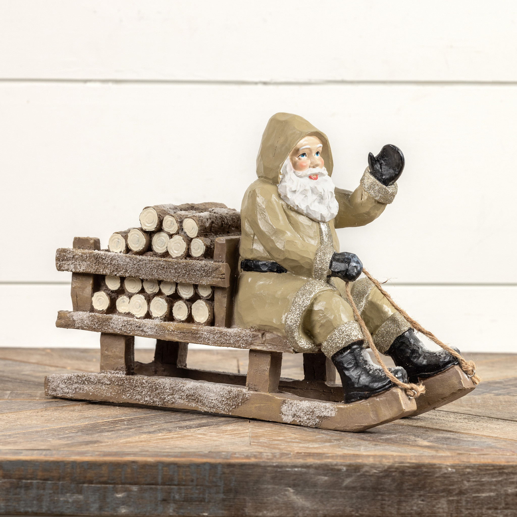 Tan Sledding Santa